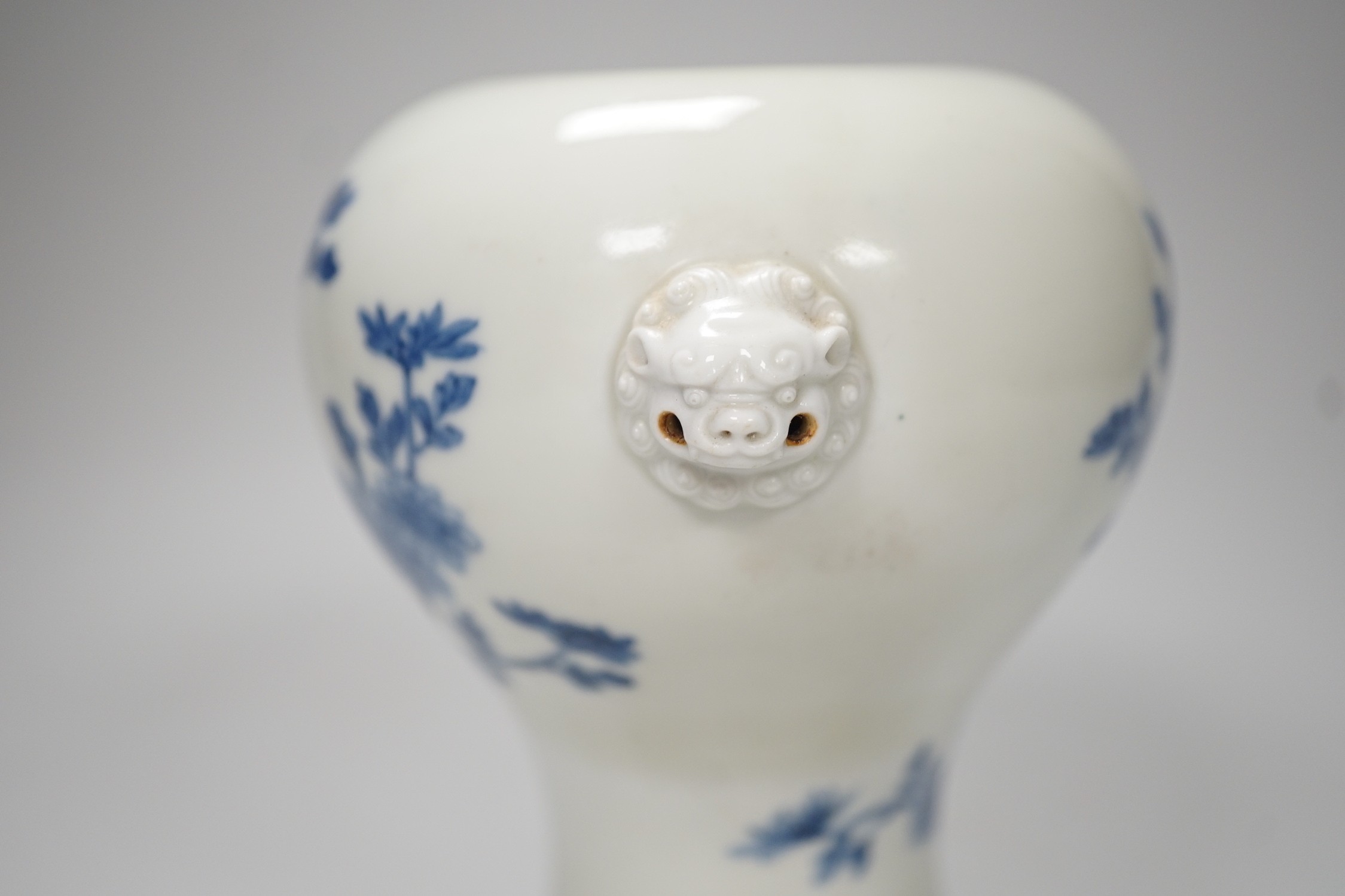A Japanese blue and white vase, Meiji period, possibly Hirado, with lion mask handles. 13cm high